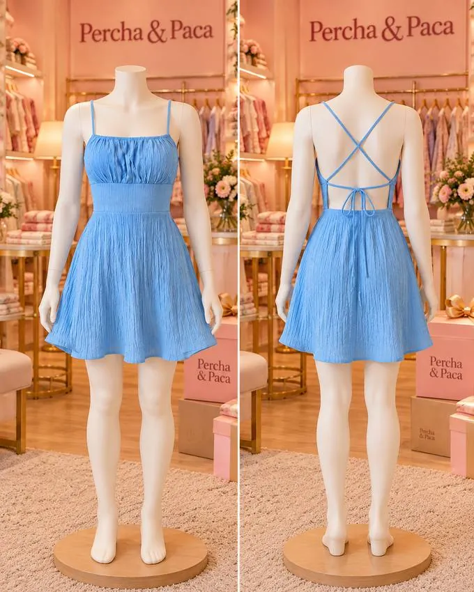 Vestido celeste de espalda cruzada · frente y espalda en la vitrina de Percha & Paca